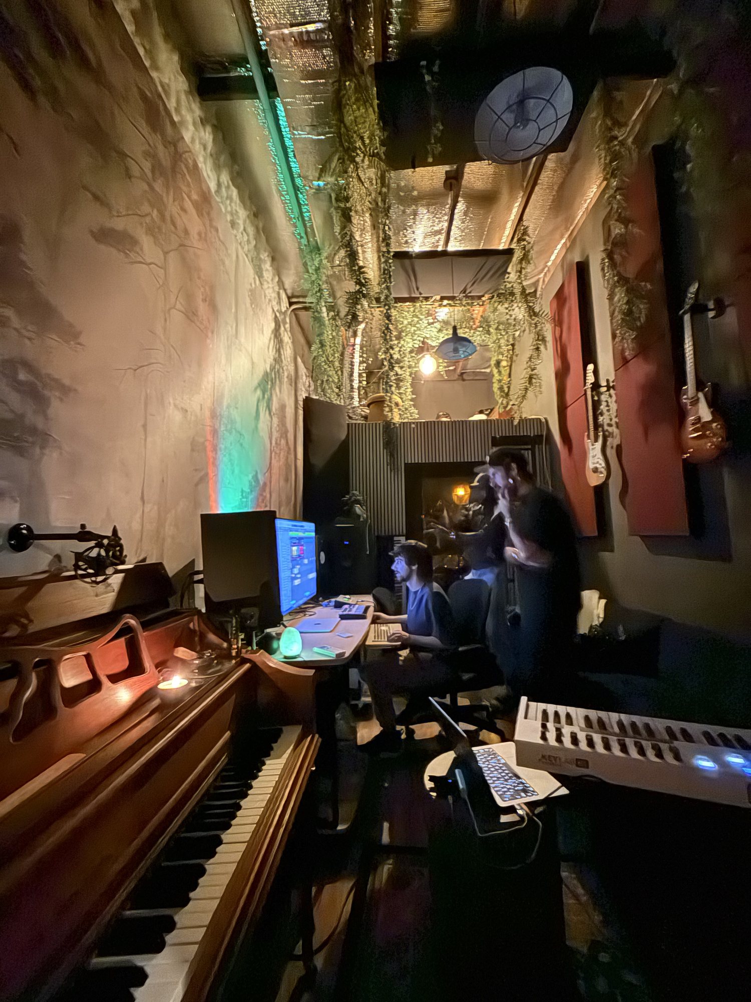 studio a — piano, desk and mural wall